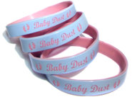 4 color coat wristbands with personal messages saying baby dust.