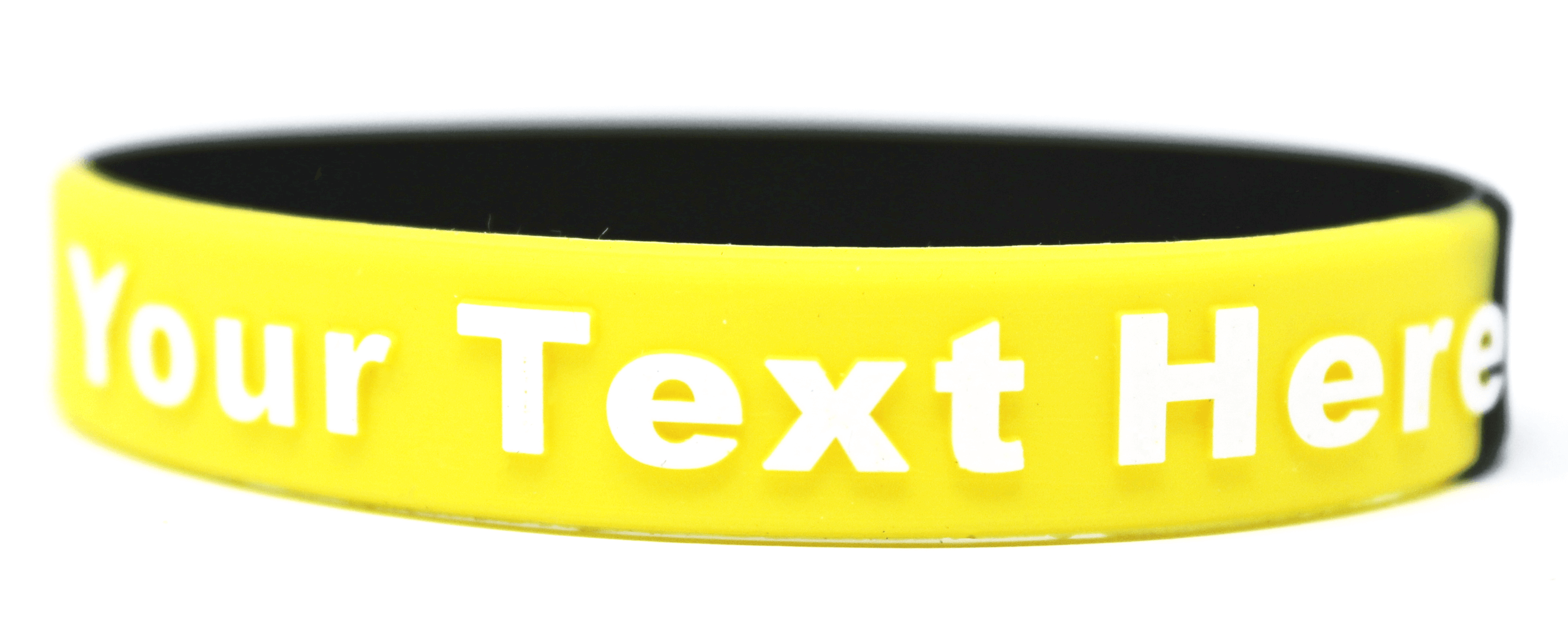 black and yellow wristband represent save the bees.