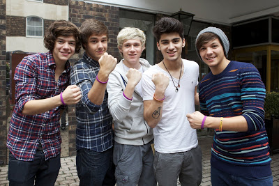 One direction rocking some wristbands.