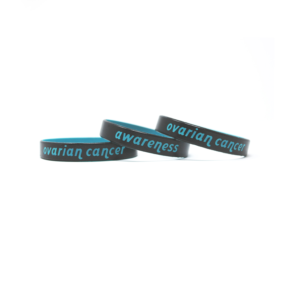 Printed wristbands that say ovarian cancer awareness.