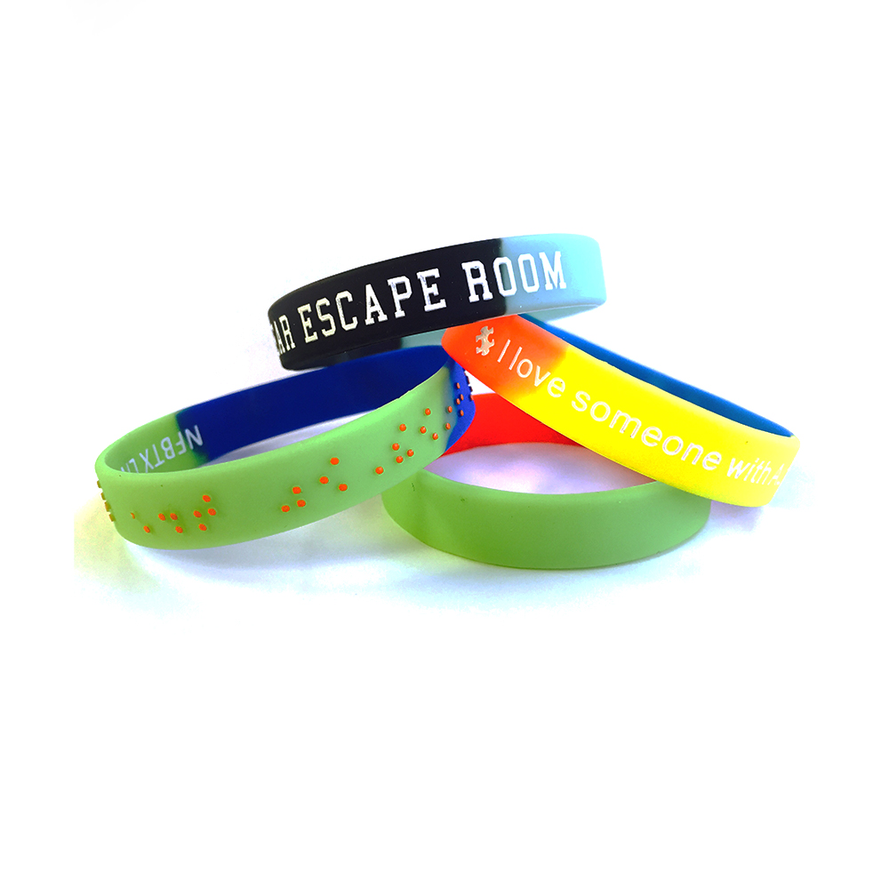 4 segmented wristbands with various messages.