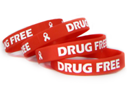 4 red ink injected wristbands with personal messages saying drug-free.